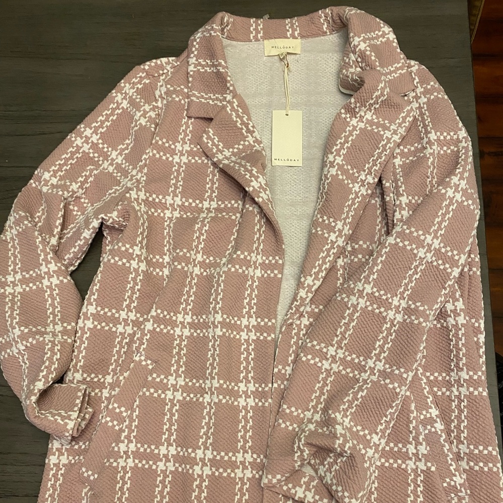 Long jacket with pockets. Never worn